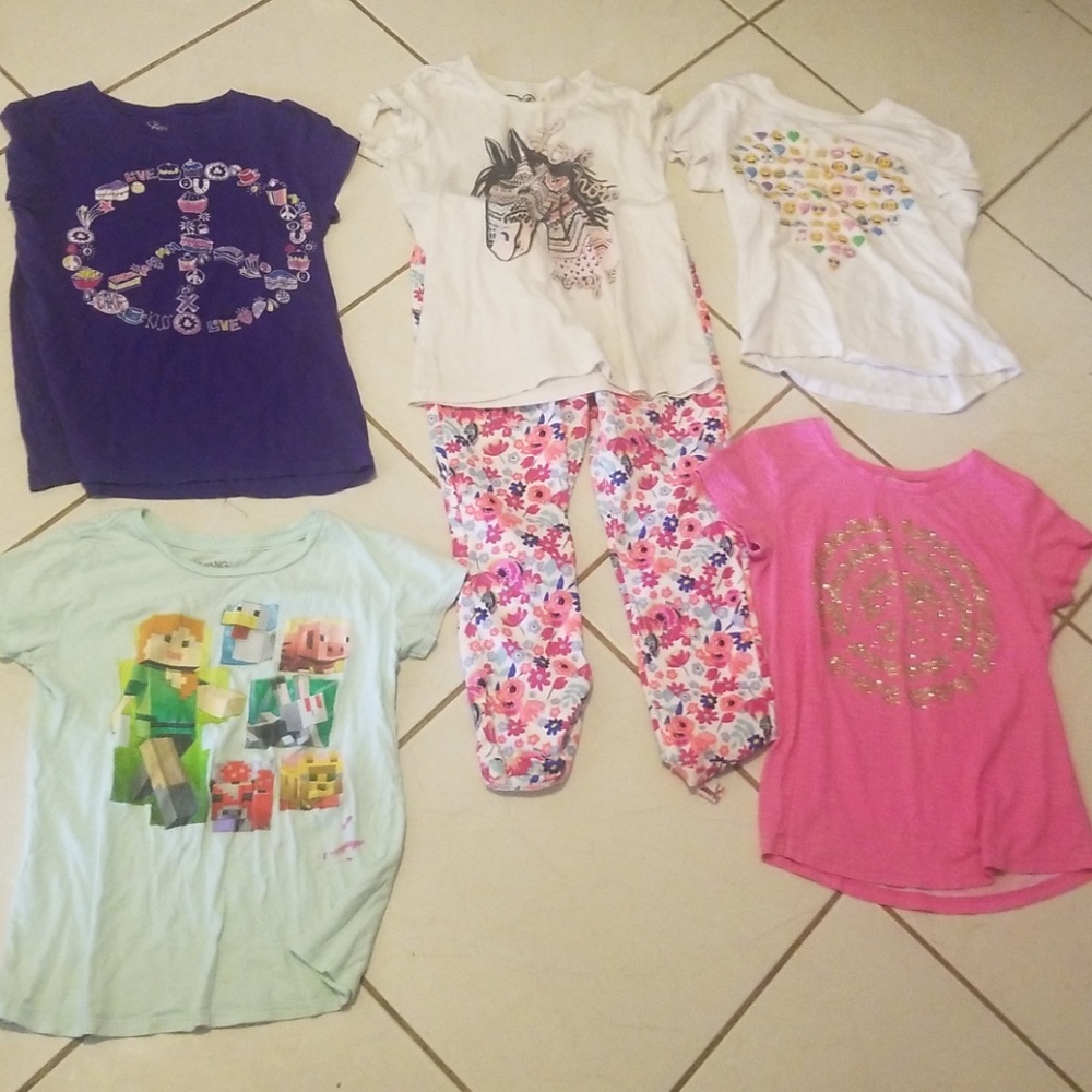 A pair of floral capre pants and 5 shirts